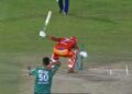 Shadab Khan yells into stump mic.