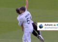 Jonny Bairstow carries the protester